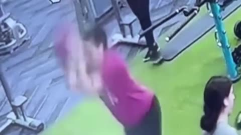 Woman slams medicine ball and finds out