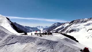 Chinese pianist performs on a Swiss mountain top