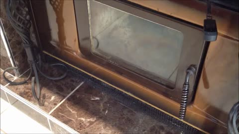 How to Clean a Fireplace Glass Door