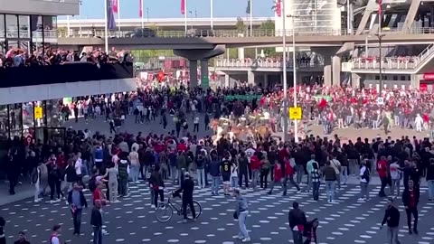 Police use tear gas to disperse rioting Ajax fans