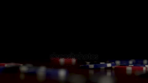 gambling chips falling isolated on black. Playing chips flying