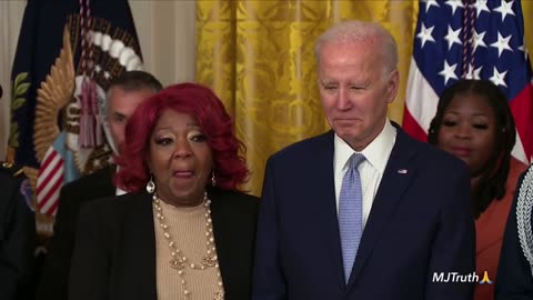 Ruby Freeman receiving Presidential Citizen's Medal for a job well done By Joe Biden