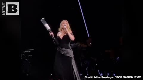 “I Dare You!” Adele Laughs, Fires T-Shirt Gun into Crowd After Warning Not to Throw Things at Her