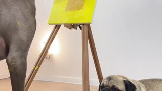 Puppy Dog Paints a Portrait of Her Pug Friend