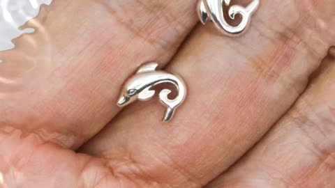 Dive into Elegance: Peter Stone Dolphin Earrings!