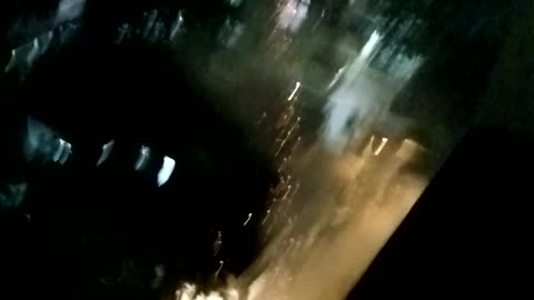 Fireworks In Front Of Window At 10th Floor