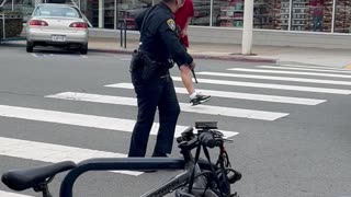 Aggressive Man Faces Off With Police Officer