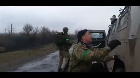 Ukrainians Inspecting Abandoned Russian Supply Convoy