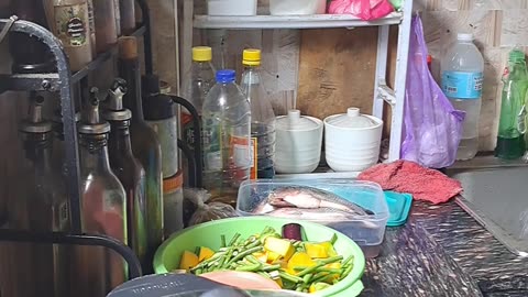 Filipino food fried tilapia and pakbet