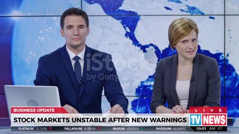 Anchors presenting business update news about unstable stock markets stock video