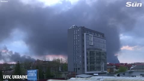 Firefighters battle blaze after blasts hit Ukraine's Lviv