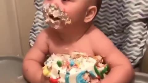 glorious moment !! baby eating the cake