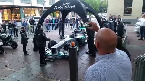 Nico Rosberg racing through Frankfurt in F1 Car