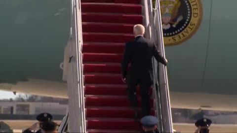 President Biden falls on Air Force One stairs