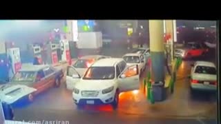 The terrifying moment a car catches fire at a petrol station