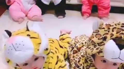 Cute twin babies playing.............