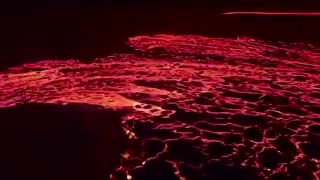 Aerial footage shows Iceland volcano spewing lava