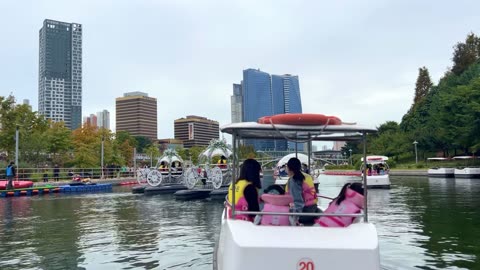 People spending time on a boat at a lake