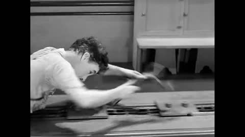 Charlie Chaplin Swallowed by a Factory Machine