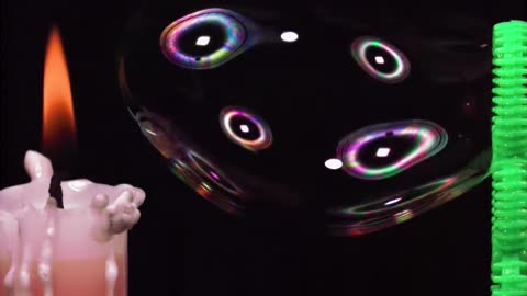 Blowing a Soap Bubble With Gas