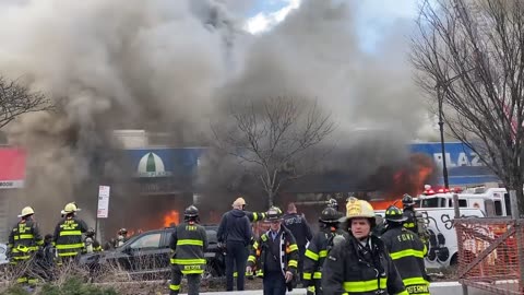 A massive fire is being fought by firefighters at a Bronx apartment complex.