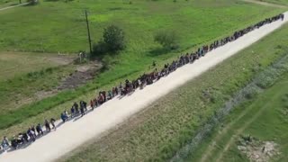 Alarming New Video Shows Hundreds Of Migrants Flowing Into Texas