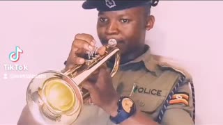 Police officer blowing a trumpet