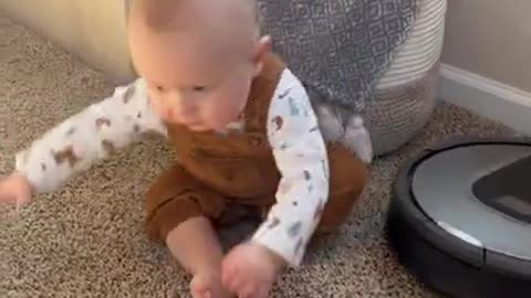 When Curiosity Meets Technology: Baby's First Encounter with a Robot Vacuum