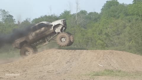 MUD Mega Trucks Jumping at Mud Bog - 4X4 Mud Off-Roading