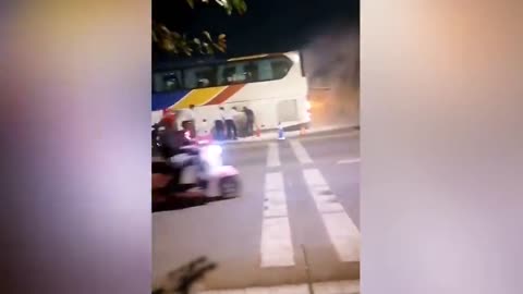 Passersby in China flag down flaming bus to allow students to evacuate vehicle