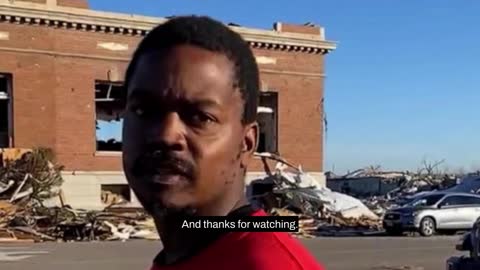 Man gives out food after deadly tornadoes in Kentucky town