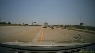 RV Door Springs into Car on Highway