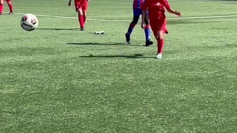 Soccer Player Takes Off Her Shoe to Land Kick