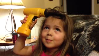 Little Girl Uses Toy Power Drill To Curl Her Hair