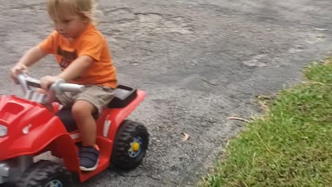 1 year old rides 4 wheeler!!!