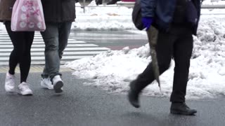 Downtown Tokyo hit with heavy snow