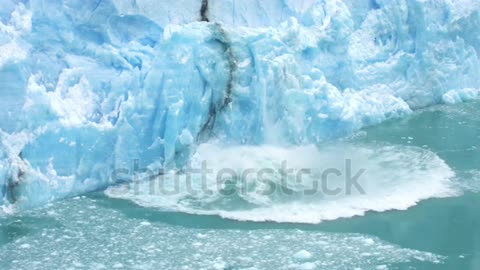 Glacier Ice Collapse Into Ocean Water, Close Up. Global Warming and Climate Change Concept