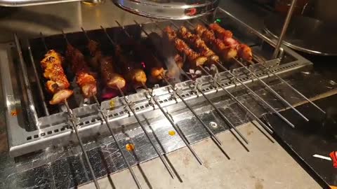 Lamb skewers are cooking deliciously