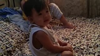 cutie baby playing on the bed