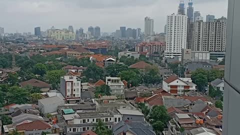 view of the city of jakarta from the top of the building