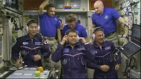 Crew Opens Hatch And Enters The International Space Station