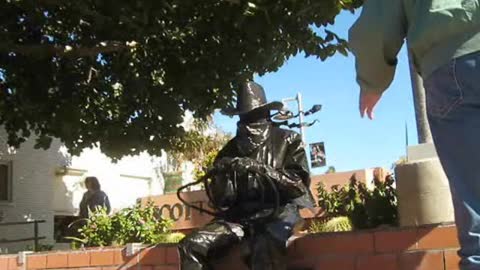 Bronze Cowboy Statue Scares Tourists That Try Posing Next To Him