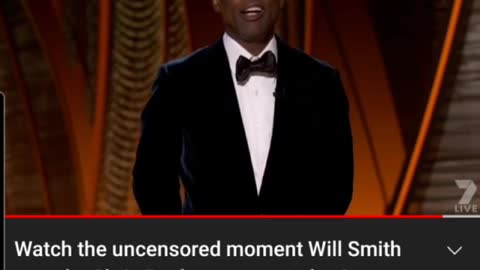 Oscar's/ " staged " Will Smith hits Chris Rock