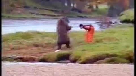 BEAR FIGHTING WITH FISHERMAN