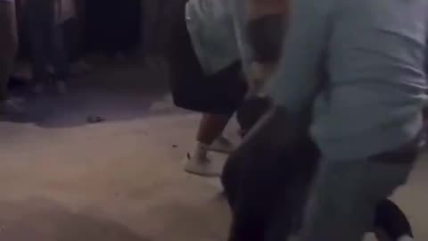 Guy protects his girlfriend from getting jumped at a concert in Houston Texas