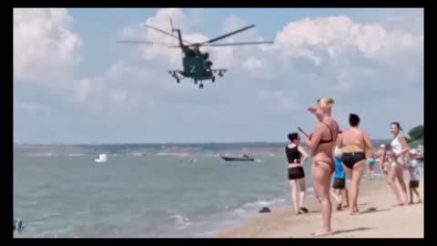 Helicopters Pass Over The Sea Of Azov In The Area Of The Settlement Melekyne Near Mariupol