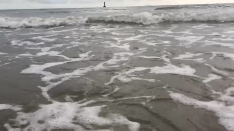 the sound of ocean waves with lighthouses in view