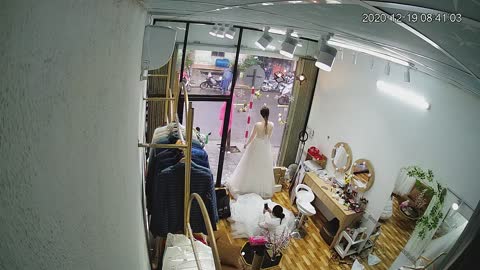 Wedding Dress Mannequin Takes a Dive