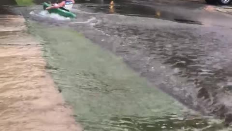 Kayaker Keeps Afloat During Flood