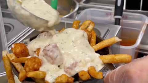 Chowder fries with cheese and bacon bits. Who are you sharing this with From